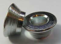 Conversion washer for Ford Ghia OE style wheels using a flat bolt.